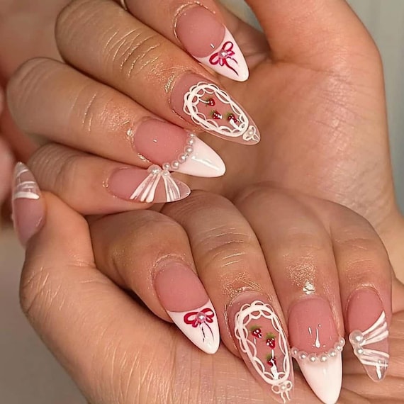 Nails with cameo charms
